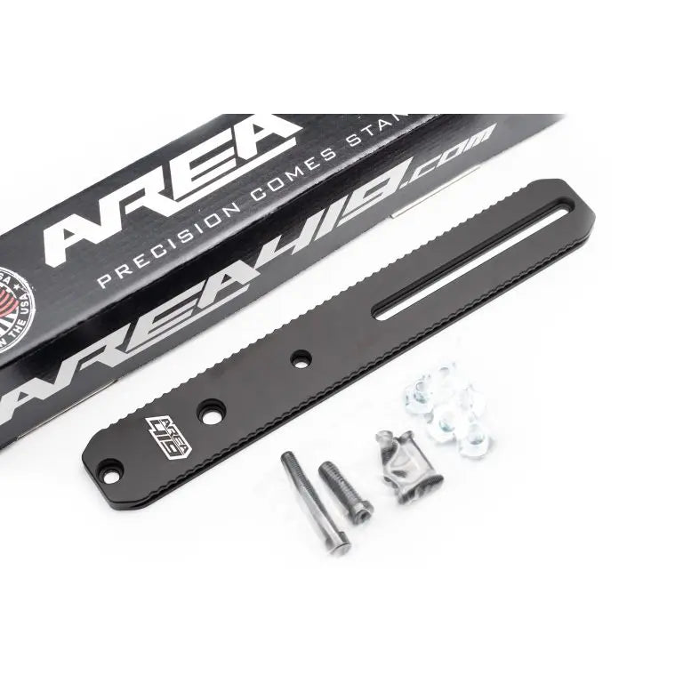 Black 8-inch universal dovetail rail with engraved logo, mounted on a rifle stock for secure weapon attachment by Area 419.
