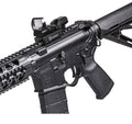 Close-up of a Firefield Multi Red Green Reflex Sight #FF13004 mounted on a black tactical firearm, showcasing sleek design.