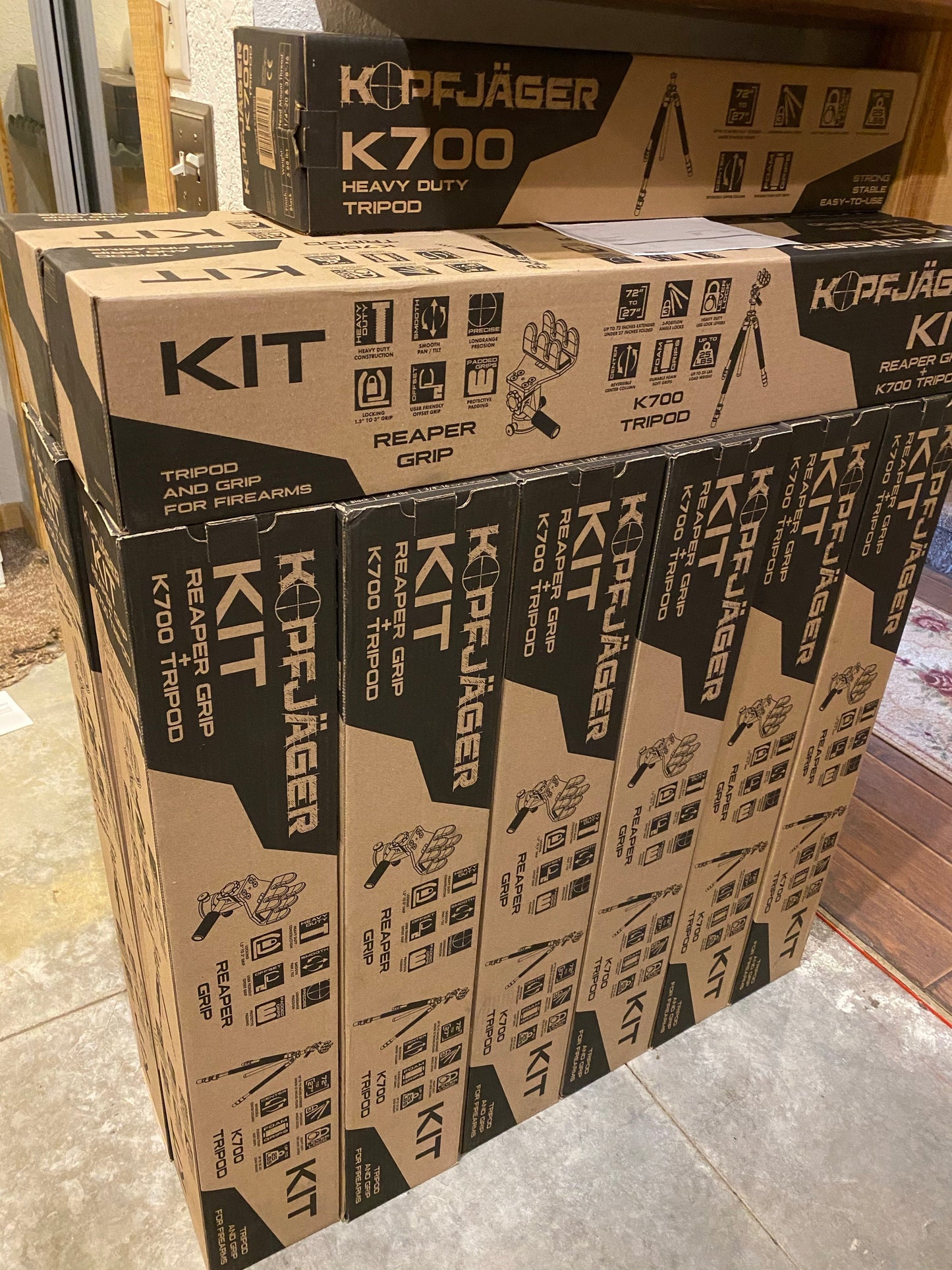 Several boxes of tripods