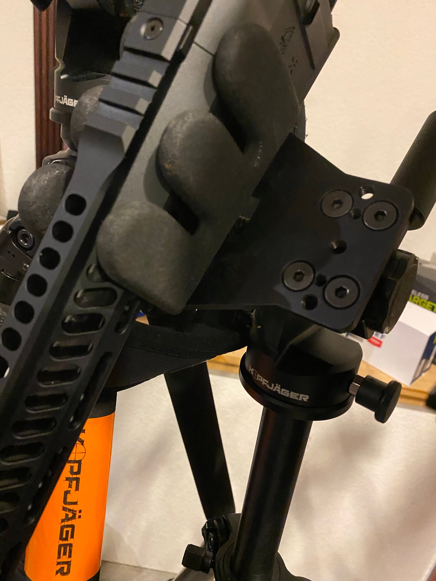 Close up of tripod holding unit